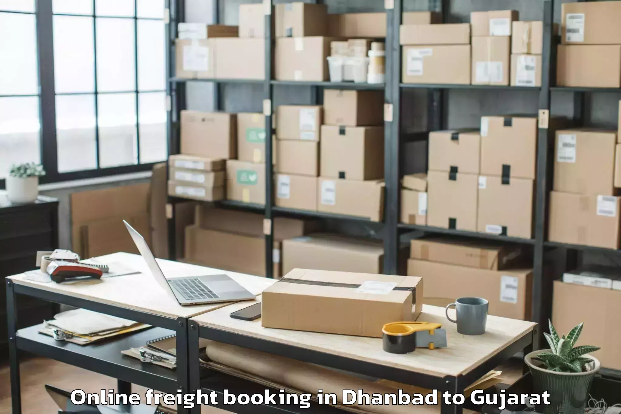 Top Dhanbad to Kodinar Online Freight Booking Available